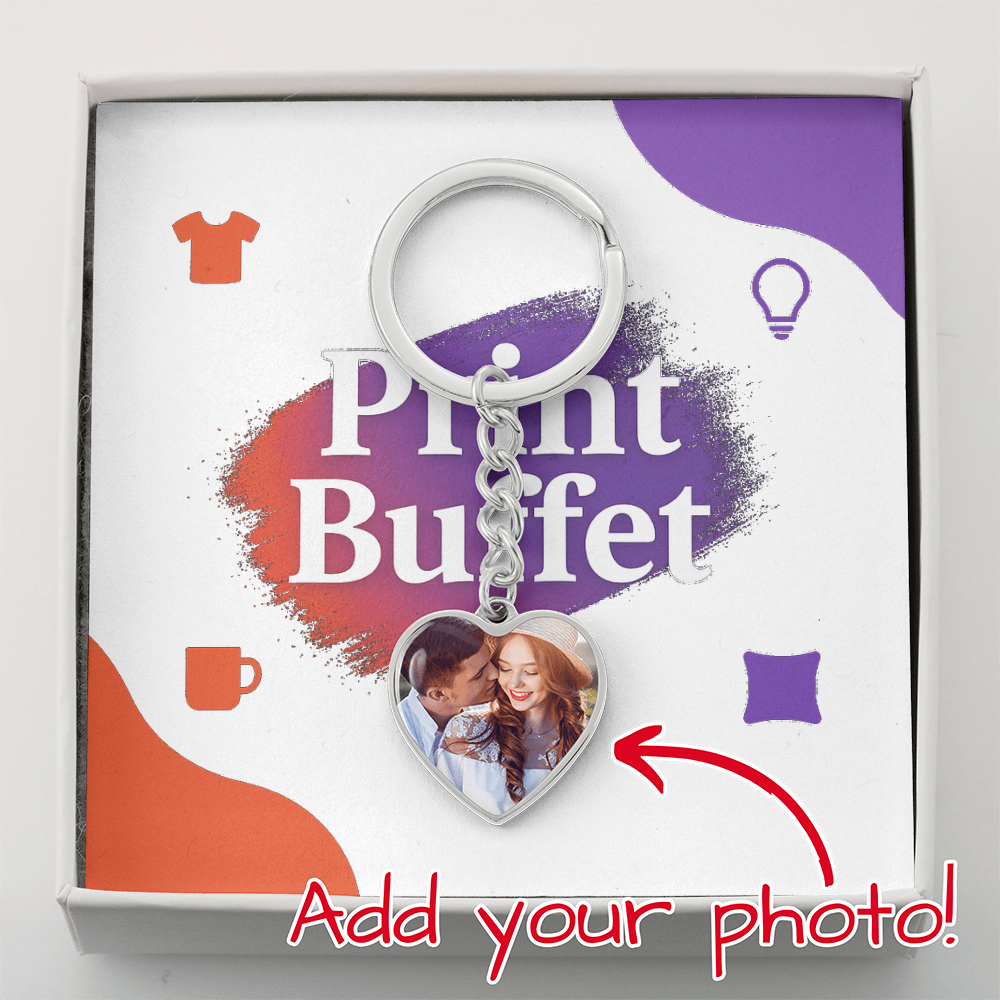 Heart-shaped photo keychain in gift box with Print Buffet logo and icons, customizable photo