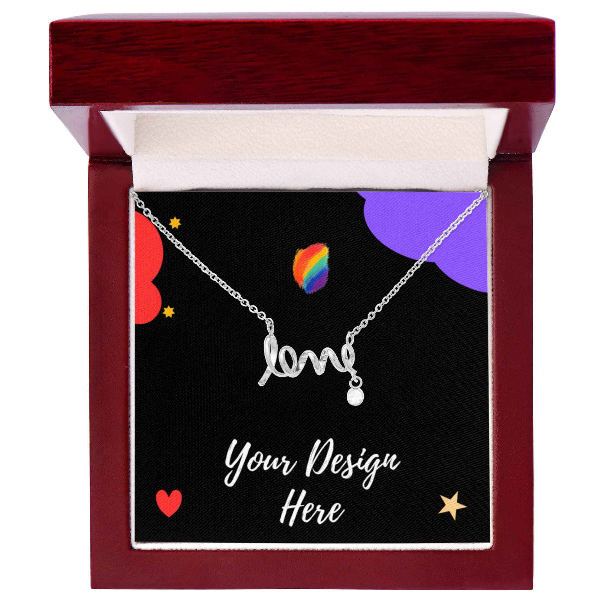Silver script love necklace with a small gemstone in a red jewelry box with colorful abstract background