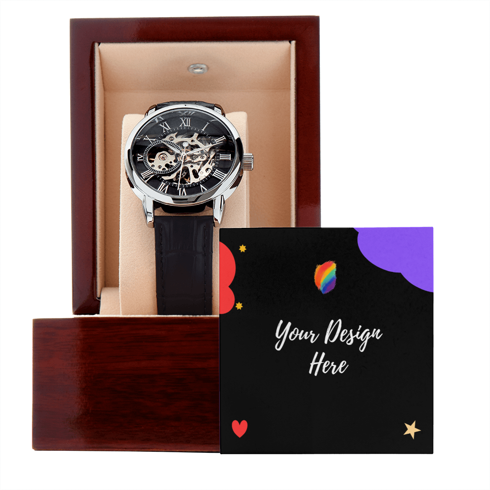 Mechanical skeleton wristwatch with black leather strap in wooden display box next to customizable design card