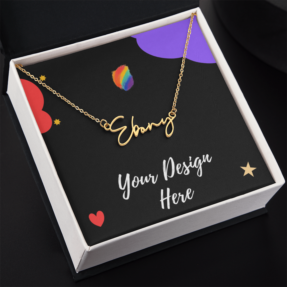 Gold name necklace with "Ebony" pendant in black gift box with colorful hearts and stars design