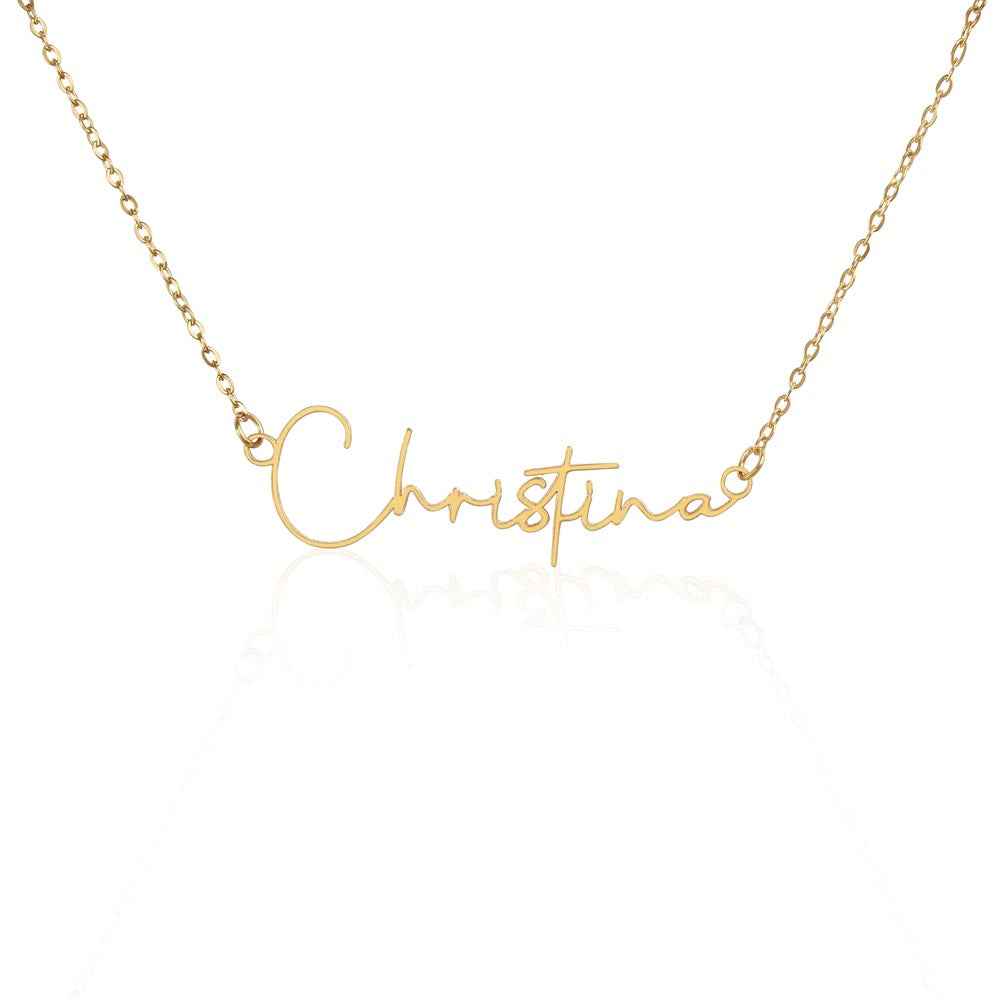 Gold name necklace with the word Christina in elegant script on white background