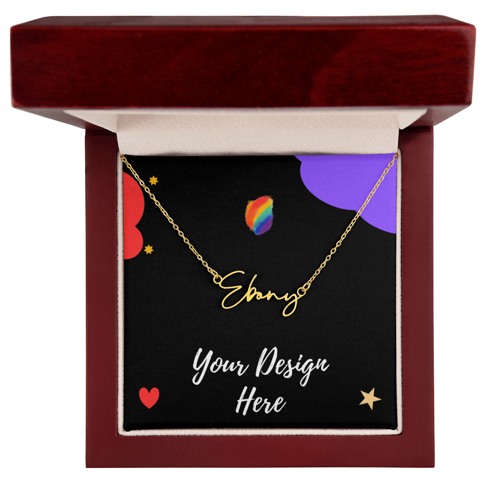 Gold name necklace reading 'Ebony' in a red jewelry box with colorful decorative background