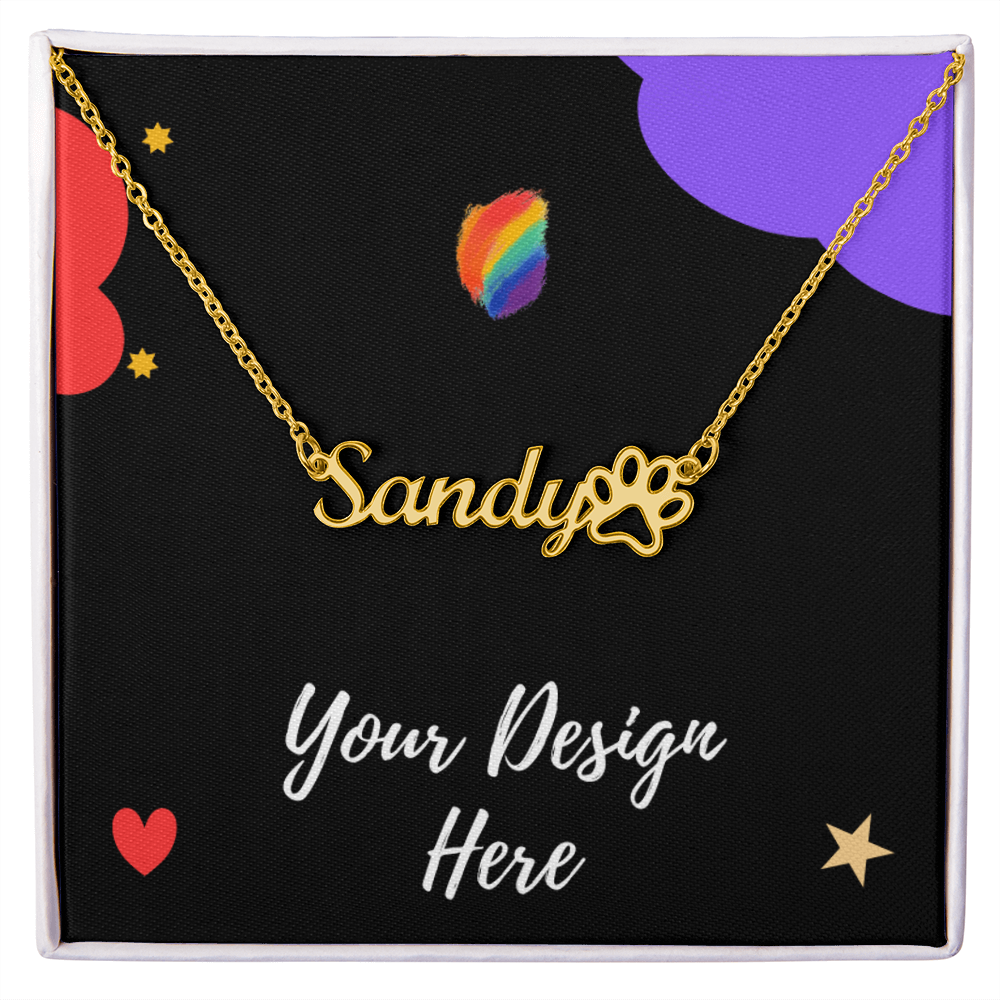 Gold necklace with custom name Sandy and paw print pendant on black display card