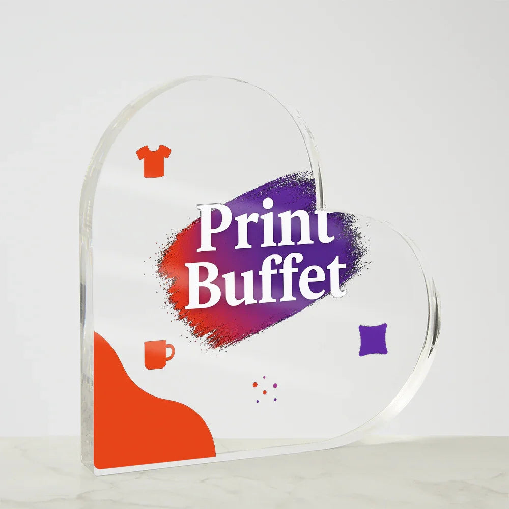 Clear heart-shaped sign with colorful Print Buffet text and icons for t-shirt, mug, and pillow