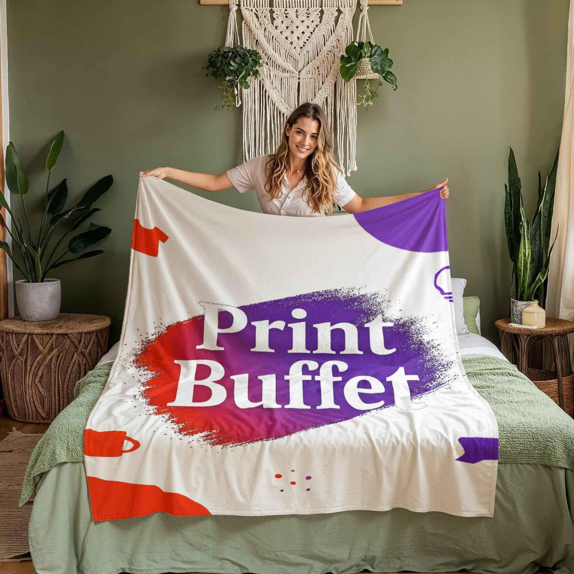Smiling woman holding white printed blanket with red and purple design, text Print Buffet in cozy bedroom