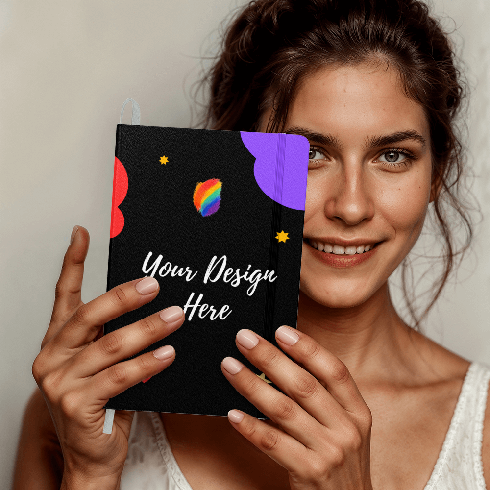 Smiling woman holding black notebook with colorful abstract design and text Your Design Here