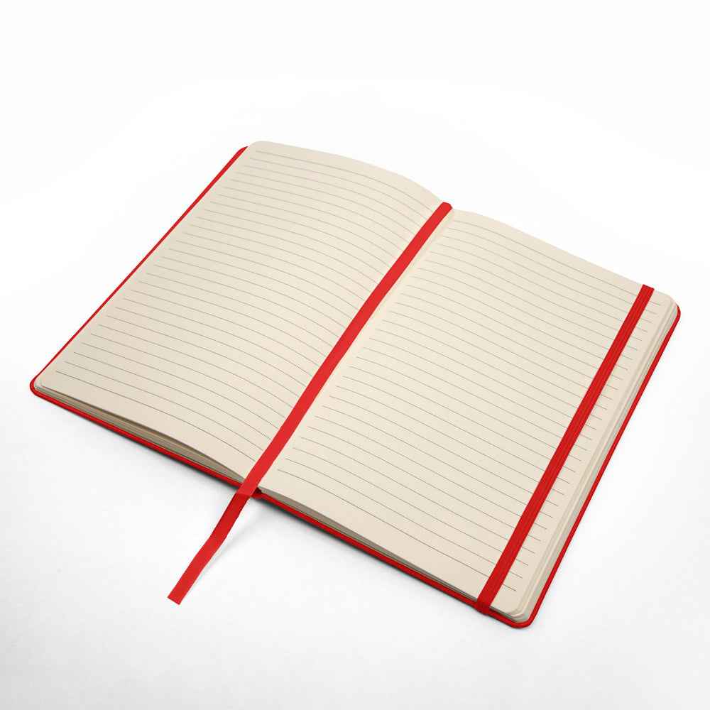 Open lined notebook with red cover, elastic band, and matching red bookmark ribbon on white background
