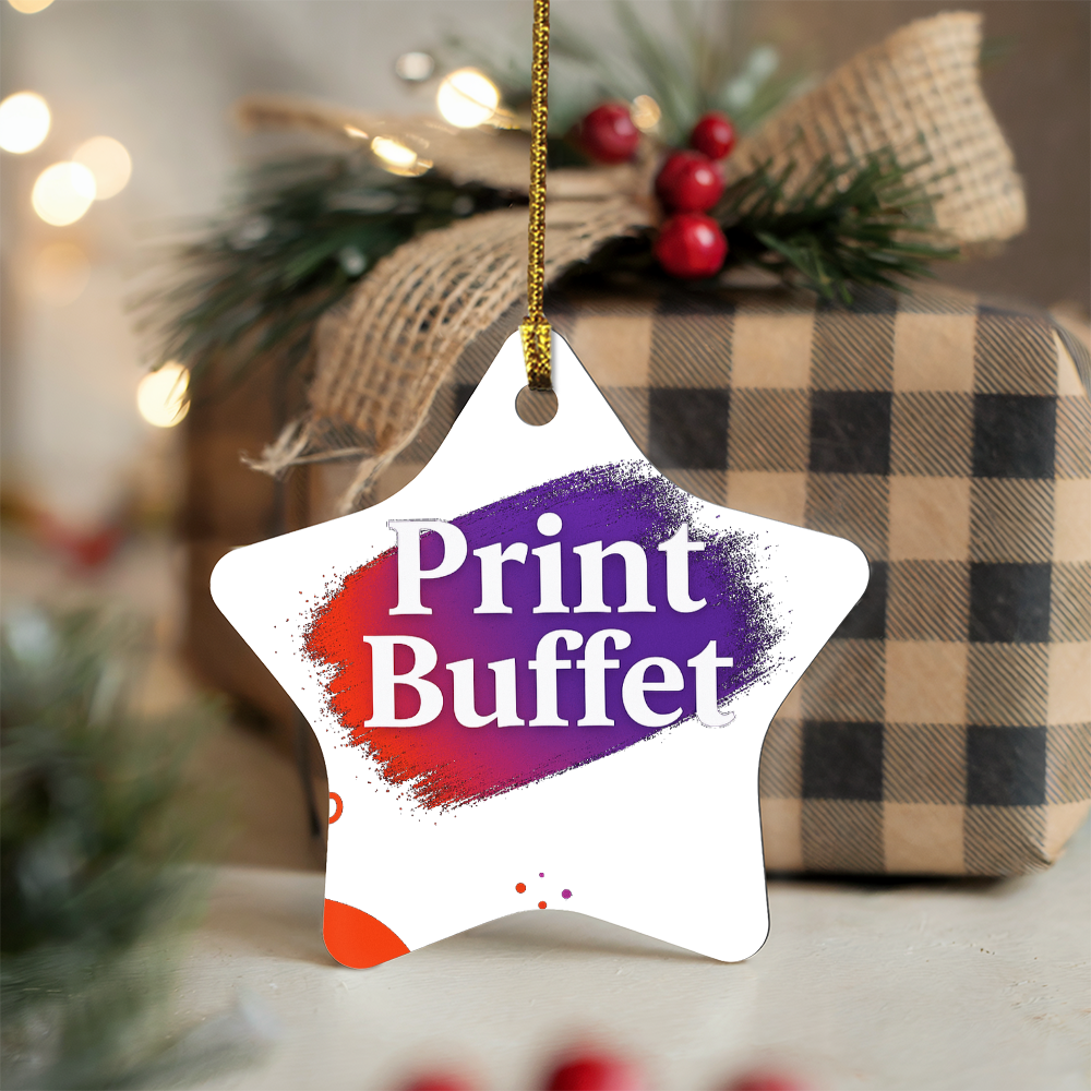 Star-shaped holiday tag with Print Buffet logo hanging in front of plaid wrapped gift and festive greenery