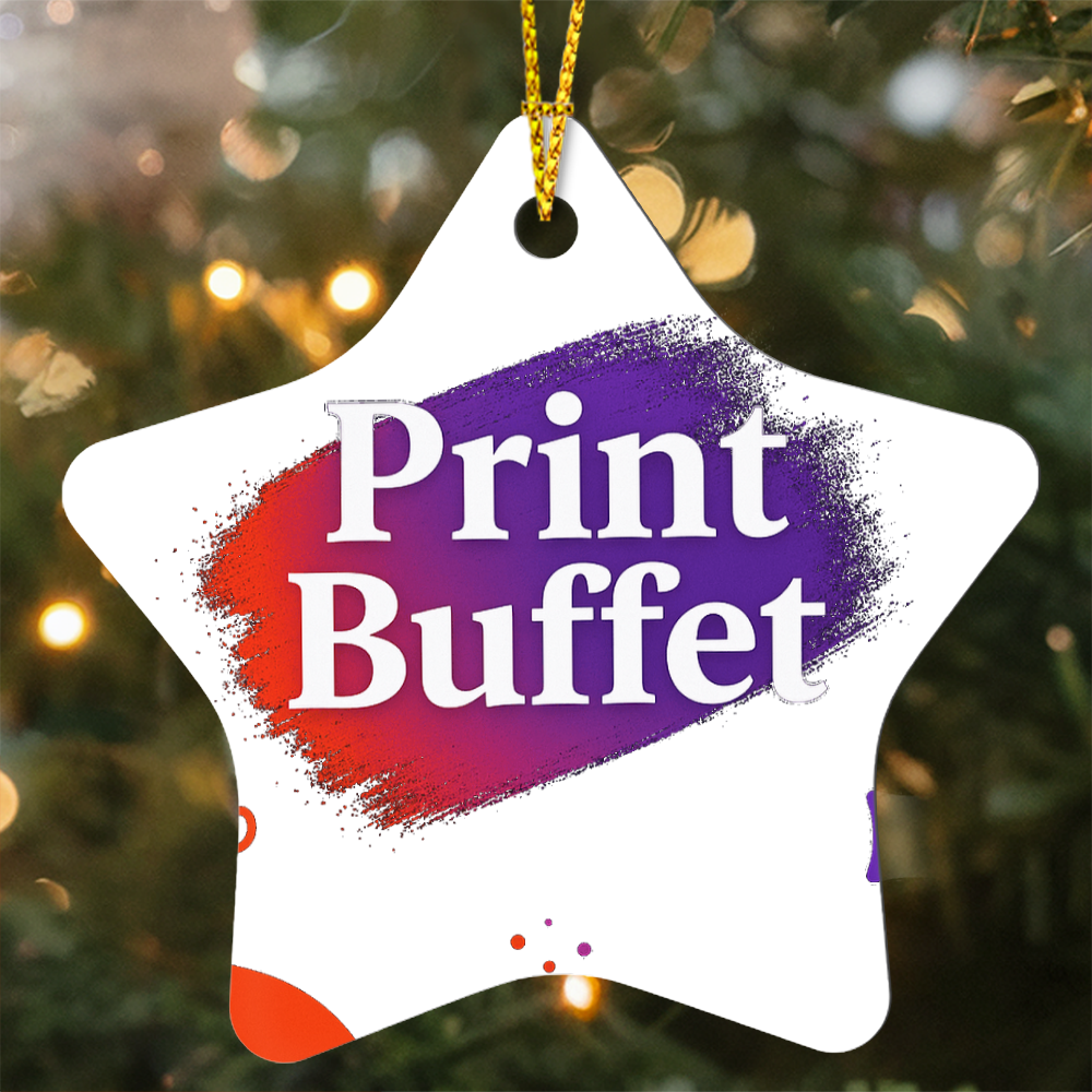 Star-shaped Christmas ornament with Print Buffet logo hanging on a decorated tree with lights