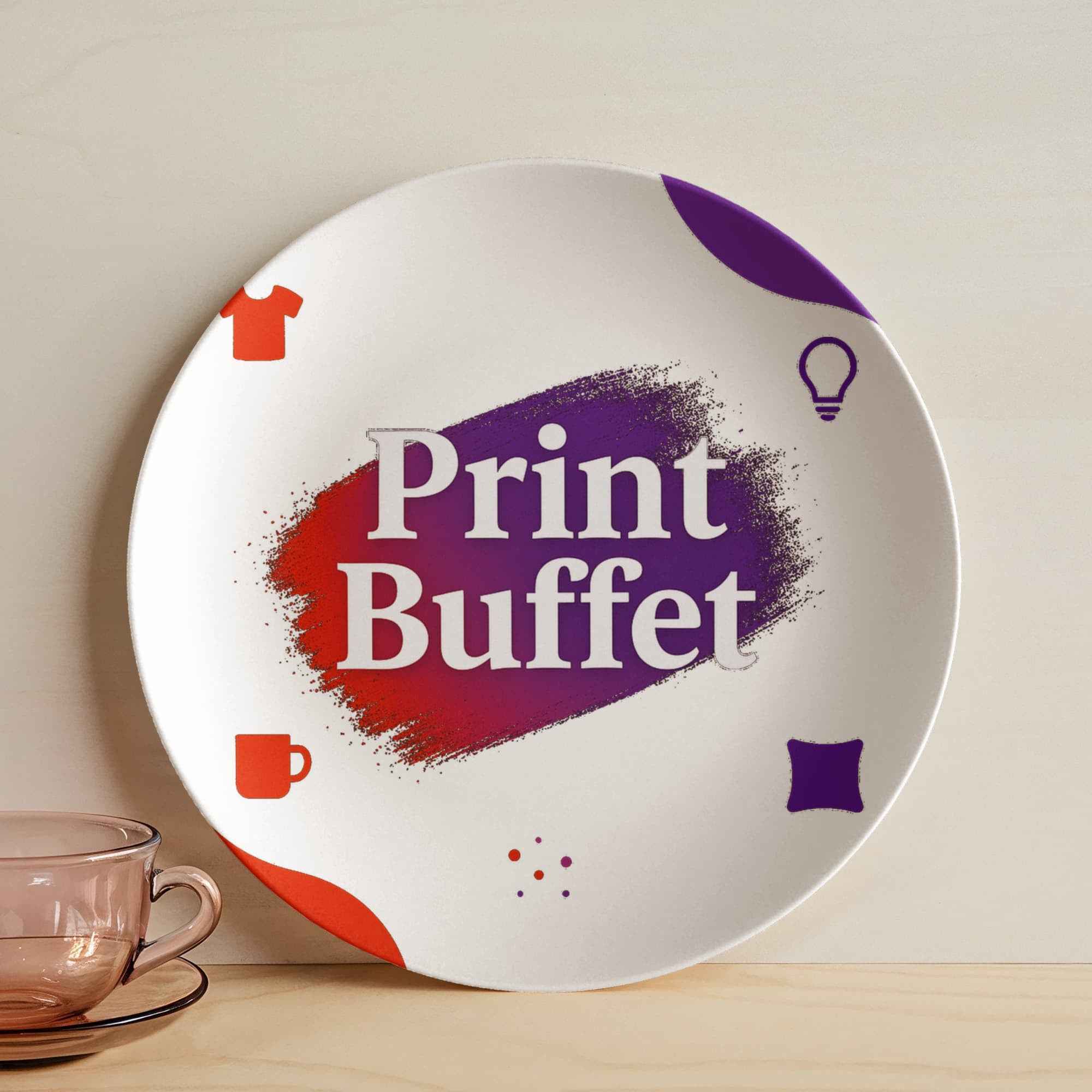 White plate with colorful red and purple brushstroke and icons, text Print Buffet in center